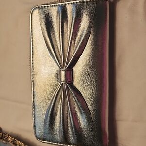 NWOT silver Clutch bag